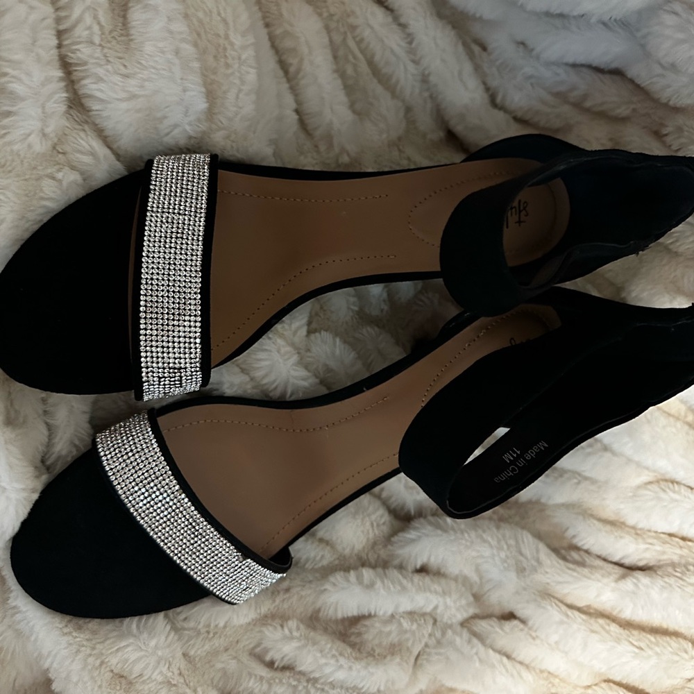 Size 11, black & sliver shoes from Macy. Brand new.